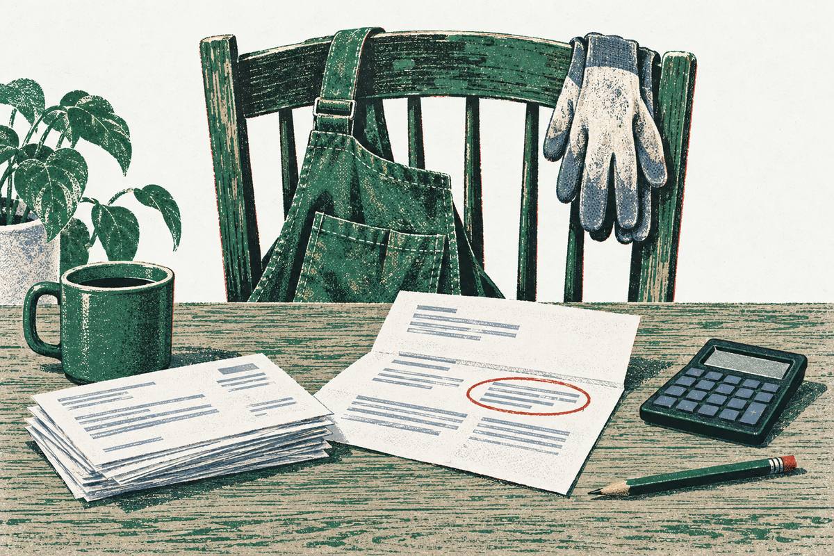 A work apron and gloves hang on a chair beside a table with pay stubs, a letter with one block circled in red, a pencil and a calculator